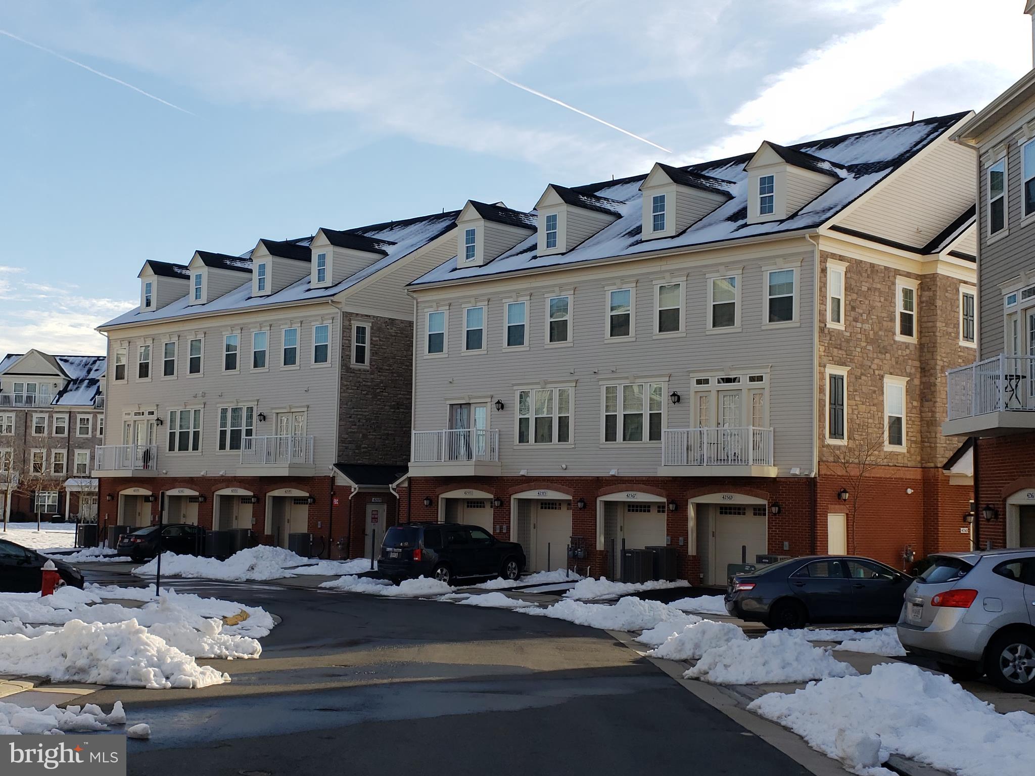 42573 Sunset Ridge Square, Unit 439 Ashburn, VA 20148 - Photo 4 of 41 Rear Building Garage View