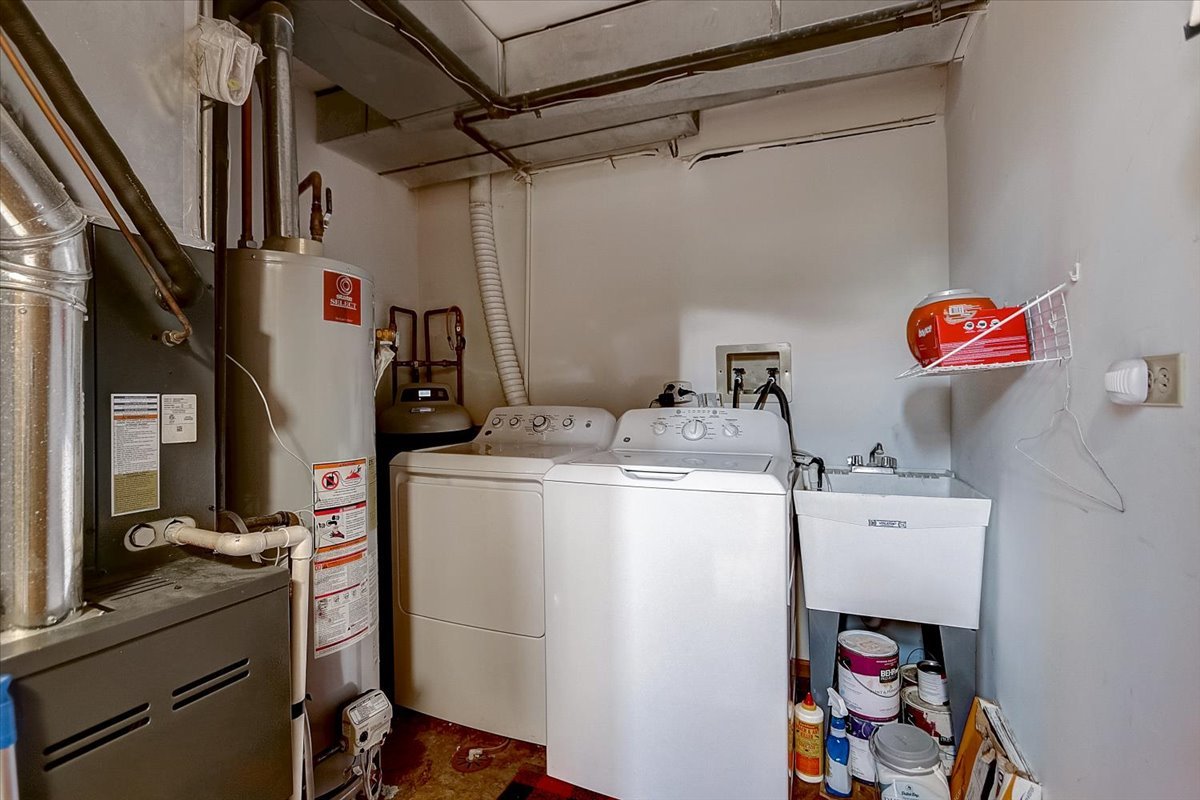 2317 Olde Mill Road Plainfield, IL 60586 - Photo 25 of 35 a storage room with washer and dryer