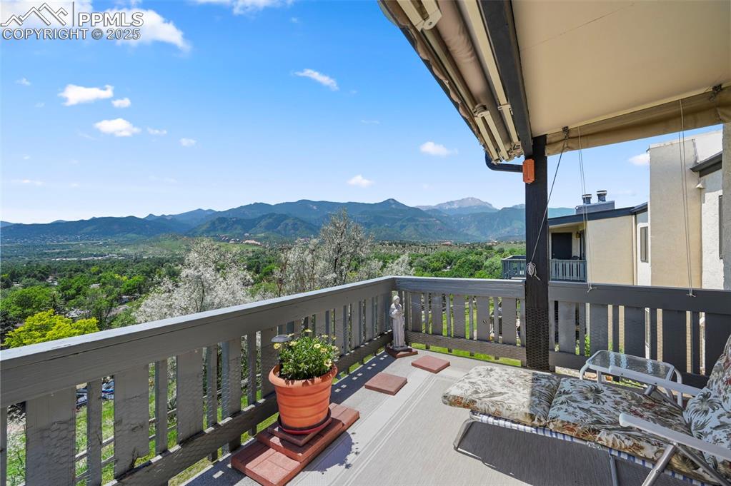 934 Fontmore Road, Unit C Colorado Springs, CO 80904 - Photo 11 of 37 a view of a chairs and table in the balcony
