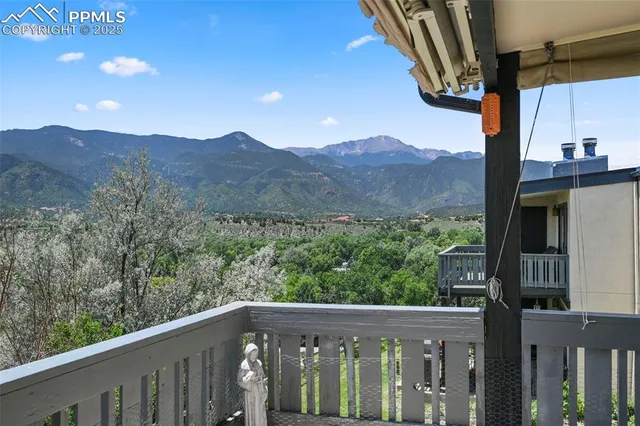 a view of a balcony with an outdoor space