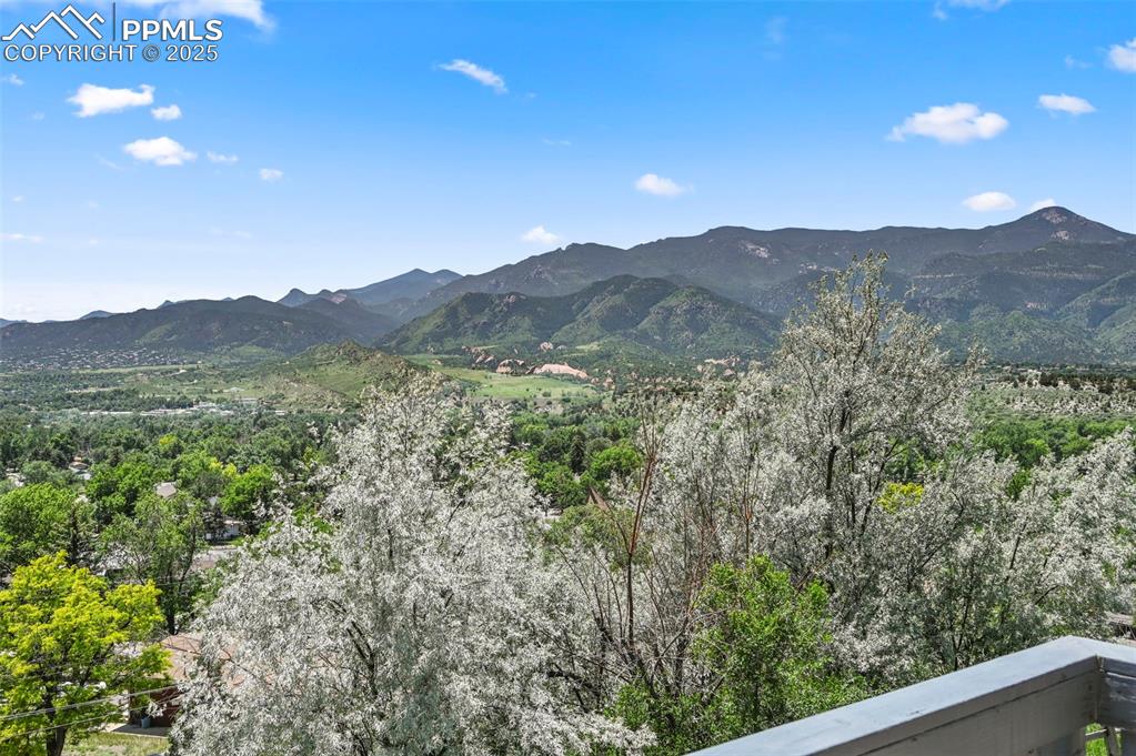 934 Fontmore Road, Unit C Colorado Springs, CO 80904 - Photo 13 of 37 a view of a mountain range with trees in the background
