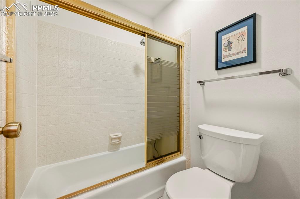 934 Fontmore Road, Unit C Colorado Springs, CO 80904 - Photo 26 of 37 a white toilet sitting next to a bath tub