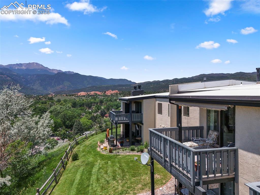 934 Fontmore Road, Unit C Colorado Springs, CO 80904 - Photo 29 of 37 a view of a house with a roof deck