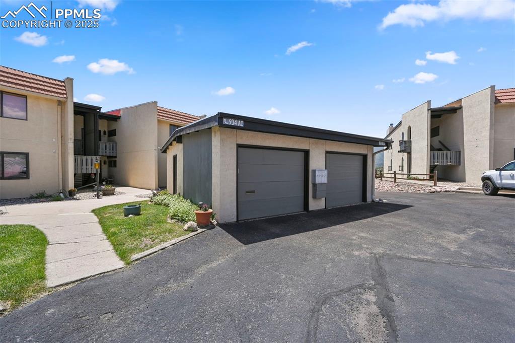 934 Fontmore Road, Unit C Colorado Springs, CO 80904 - Photo 36 of 37 a view of a house with a garage