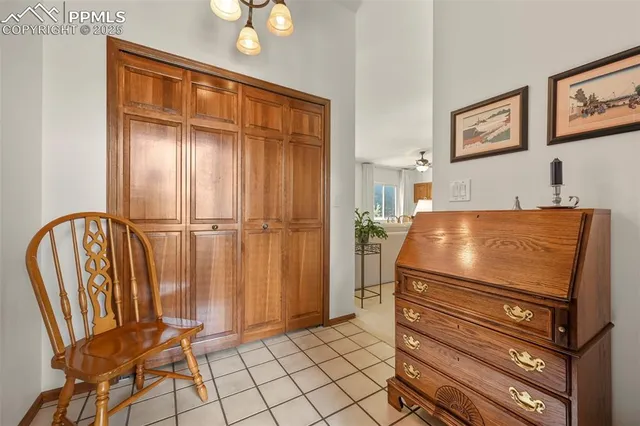 a view of a balcony with furniture