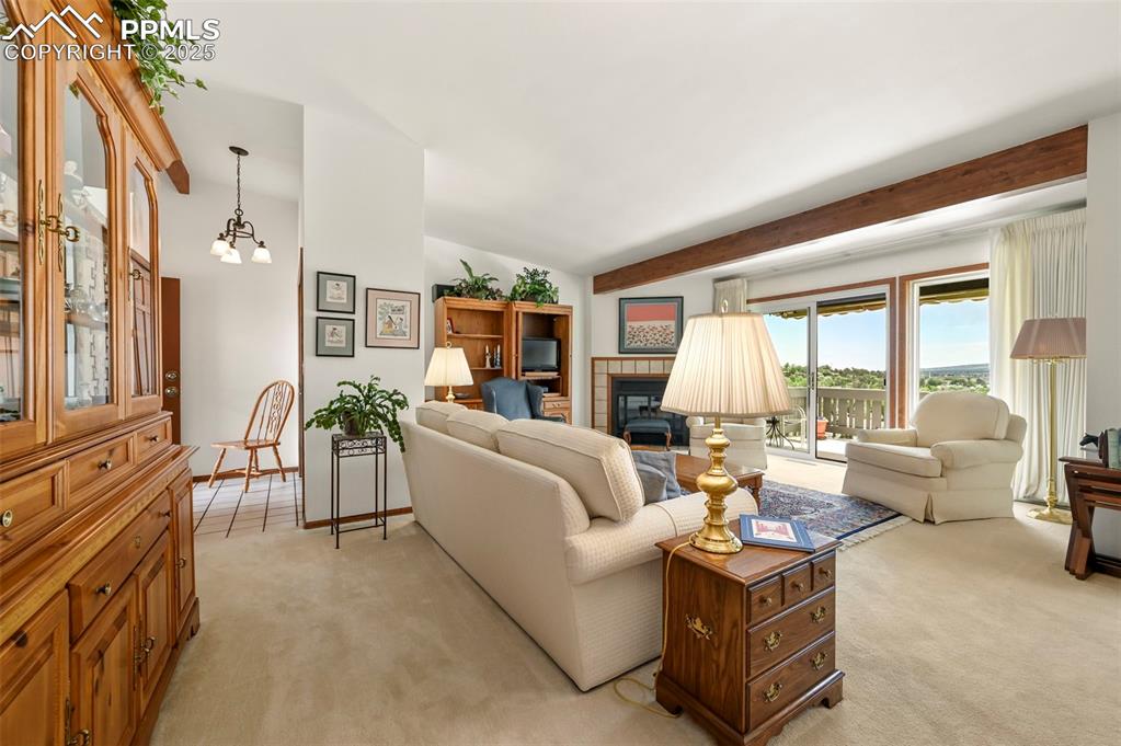 934 Fontmore Road, Unit C Colorado Springs, CO 80904 - Photo 6 of 37 a living room with furniture and a large window