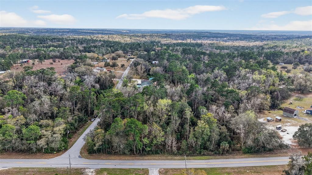 Powell Road Brooksville, FL 34602 - Photo 17 of 28 an aerial view of residential houses with outdoor space and trees