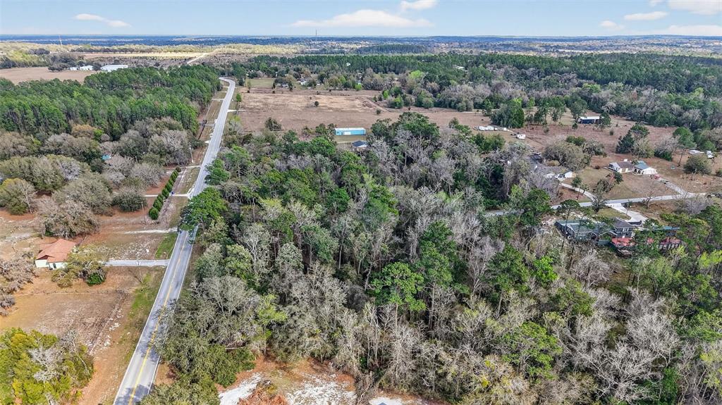 Powell Road Brooksville, FL 34602 - Photo 19 of 28 a view of a city with lush green forest