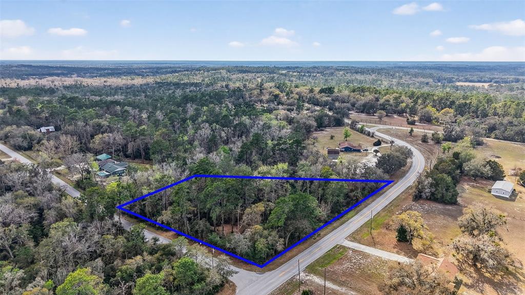 Powell Road Brooksville, FL 34602 - Photo 2 of 28 a view of a outdoor space with a lake view