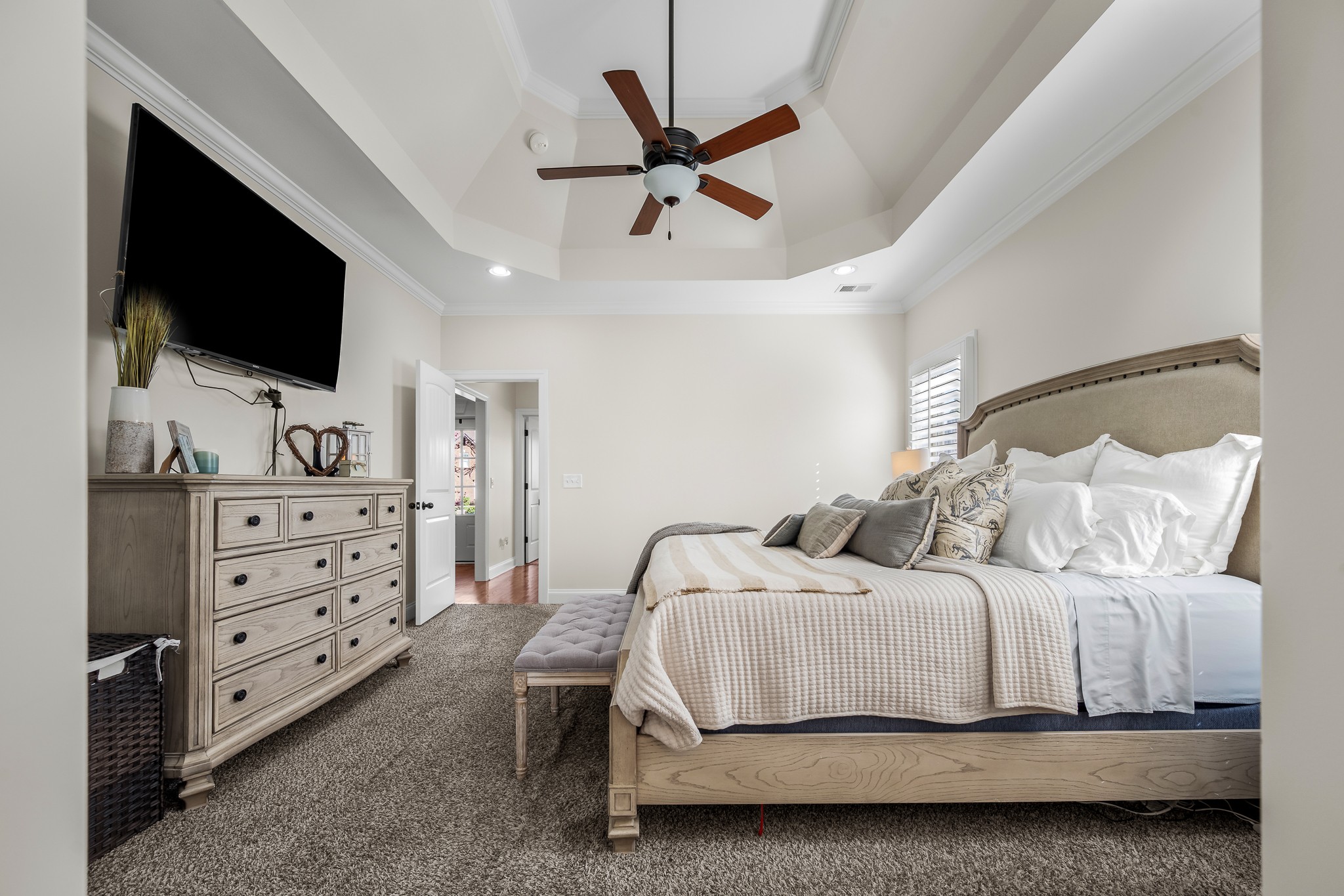 3023 Columnar Court Murfreesboro, TN 37129 - Photo 30 of 55 a bedroom with a bed a flat screen tv and a ceiling fan