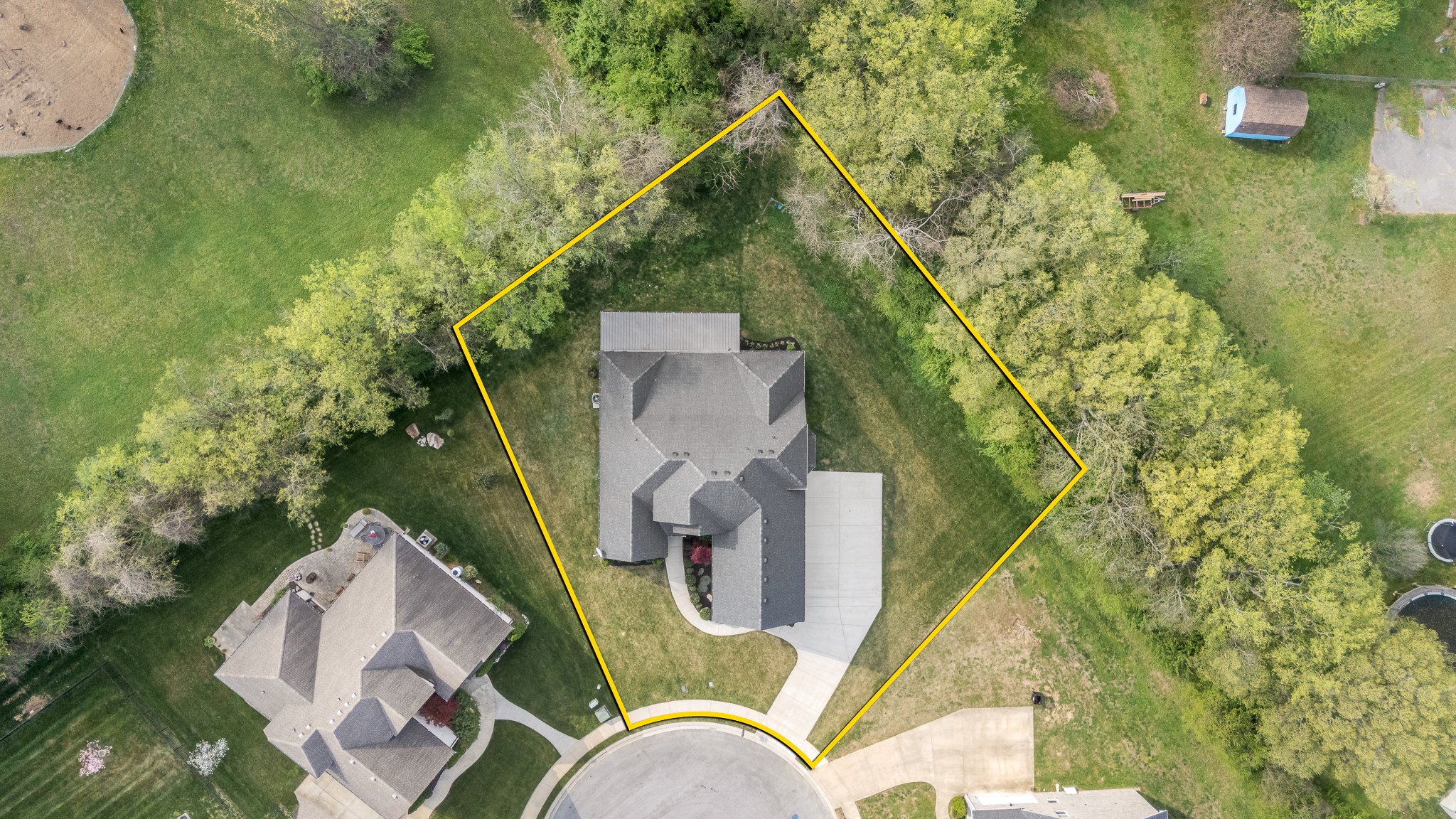 3023 Columnar Court Murfreesboro, TN 37129 - Photo 3 of 55 an aerial view of a house with a yard and shrubs