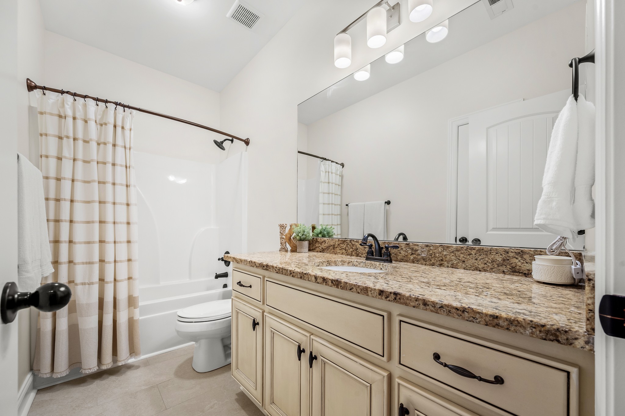 3023 Columnar Court Murfreesboro, TN 37129 - Photo 37 of 55 a bathroom with a granite countertop double vanity sink toilet mirror and shower