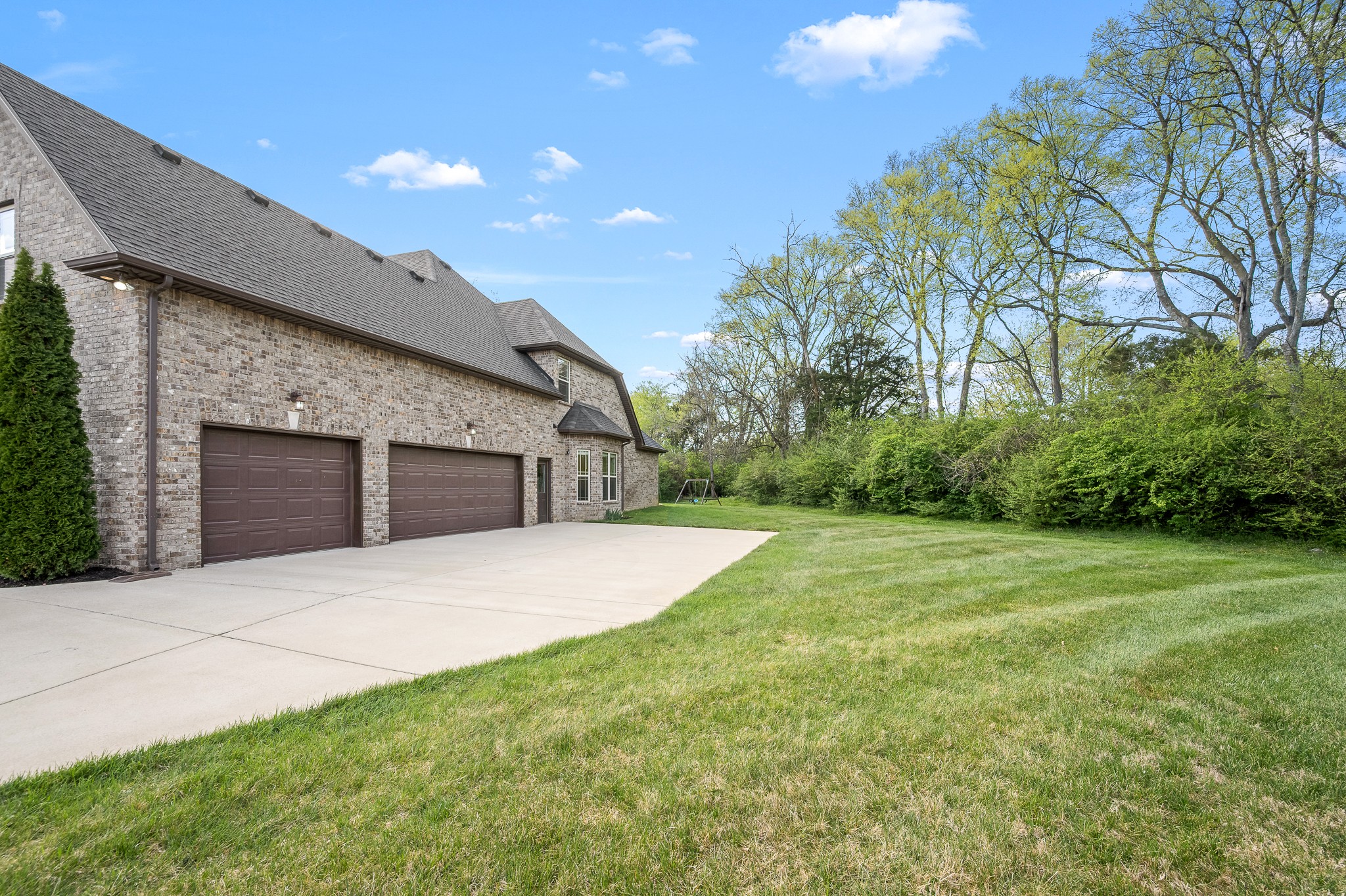 3023 Columnar Court Murfreesboro, TN 37129 - Photo 54 of 55 a front view of a house with a yard and garage