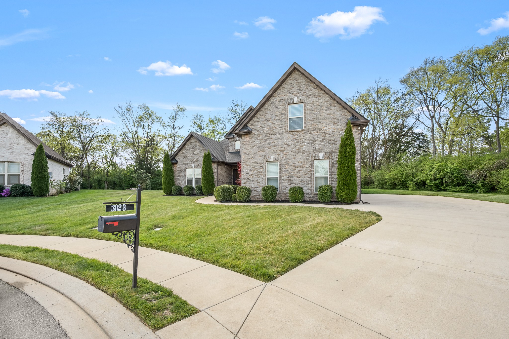 3023 Columnar Court Murfreesboro, TN 37129 - Photo 55 of 55 a front view of a house with a yard and garage