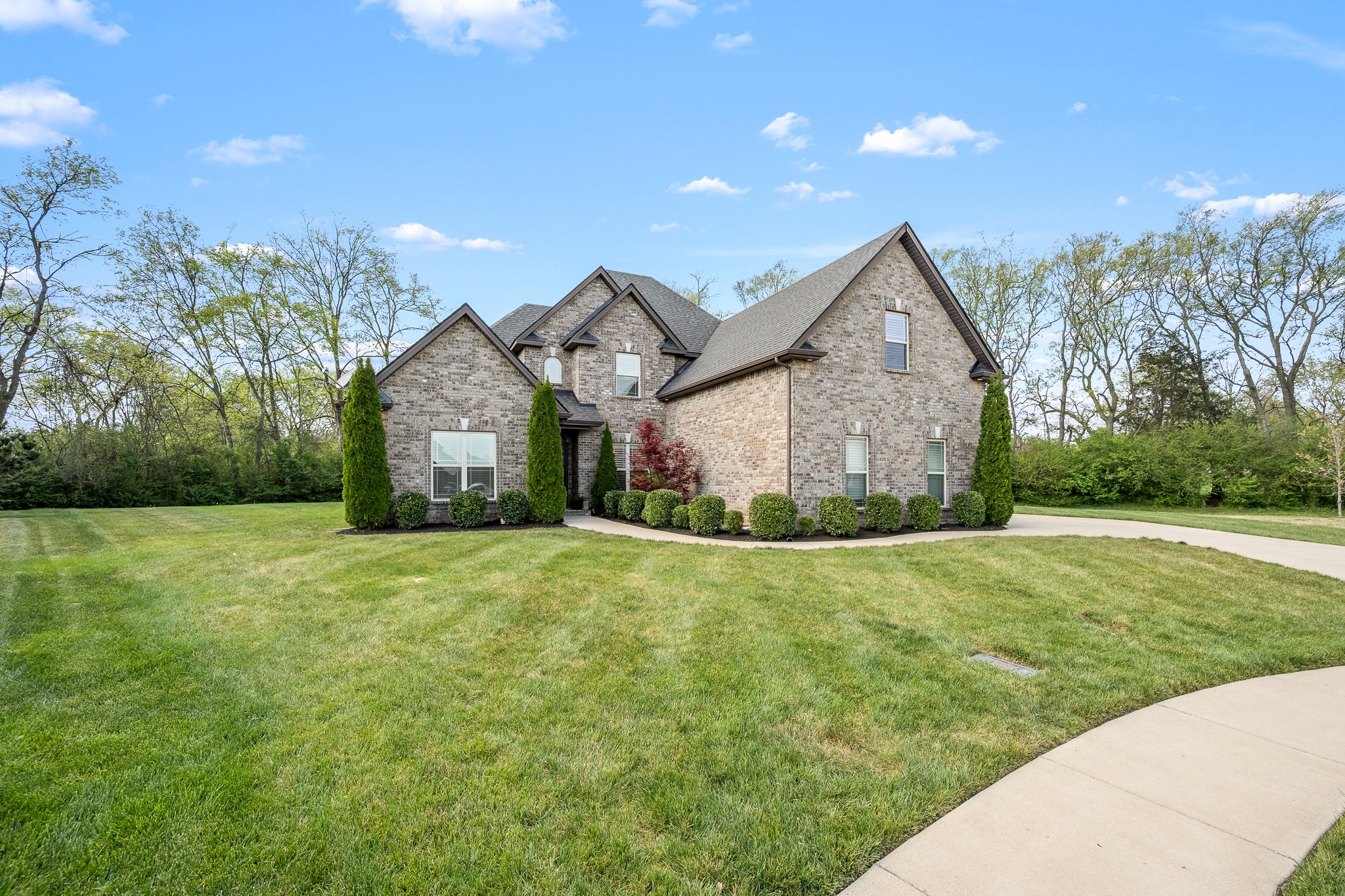 3023 Columnar Court Murfreesboro, TN 37129 - Photo 6 of 55 a front view of a house with yard and green space
