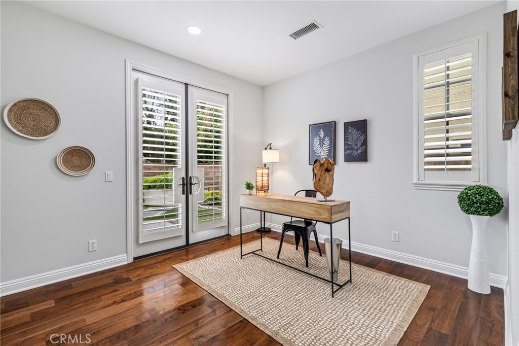 12 John Street Ladera Ranch, CA 92694 - Photo 16 of 37 a workspace with furniture hardwood and a window