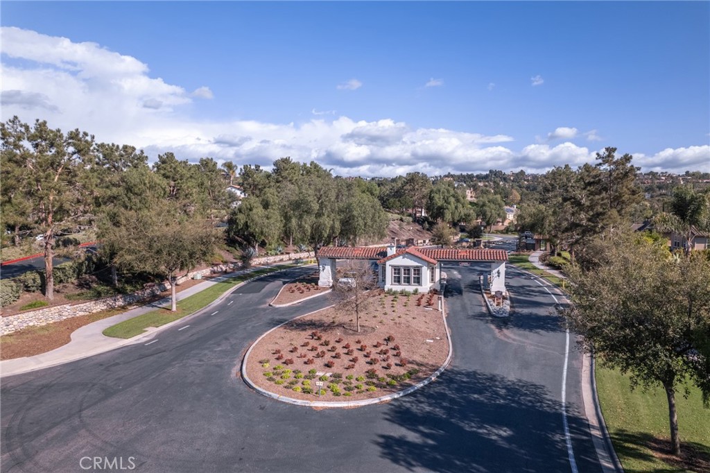 12 John Street Ladera Ranch, CA 92694 - Photo 2 of 37 a view of a swimming pool with a patio and a yard