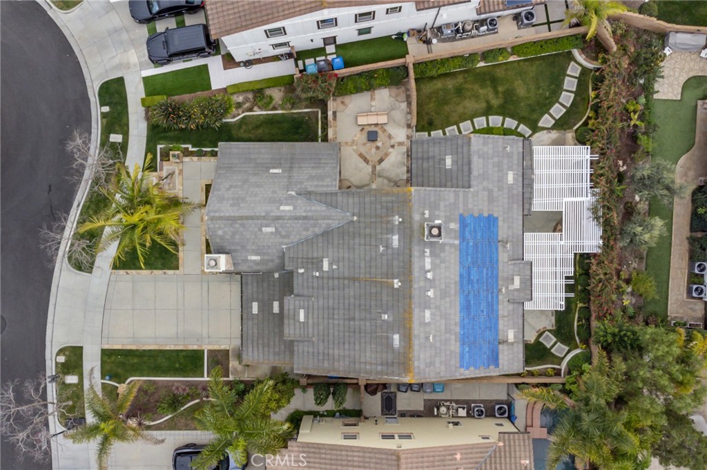 12 John Street Ladera Ranch, CA 92694 - Photo 35 of 37 a picture of a building with yard and outdoor seating