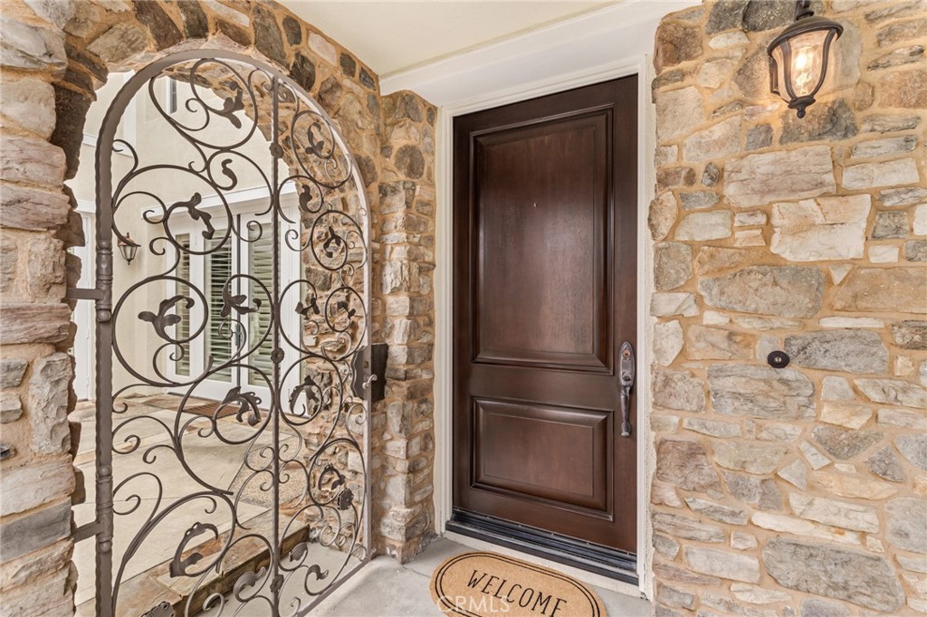 12 John Street Ladera Ranch, CA 92694 - Photo 4 of 37 a kitchen with a refrigerator and a window
