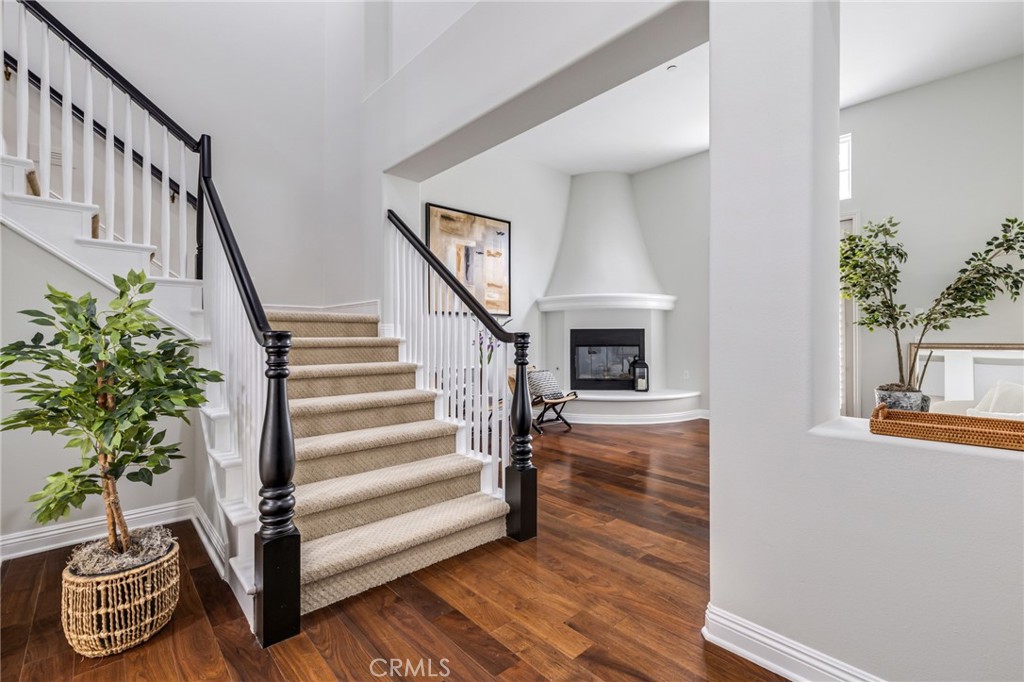 12 John Street Ladera Ranch, CA 92694 - Photo 5 of 37 a view of entryway with wooden floor and a potted plant