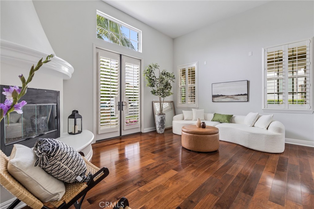12 John Street Ladera Ranch, CA 92694 - Photo 7 of 37 a living room with furniture and a large window