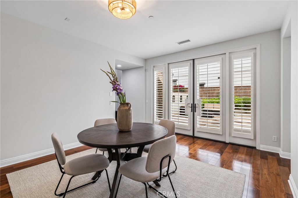 12 John Street Ladera Ranch, CA 92694 - Photo 9 of 37 a view of a livingroom with furniture and a potted plant