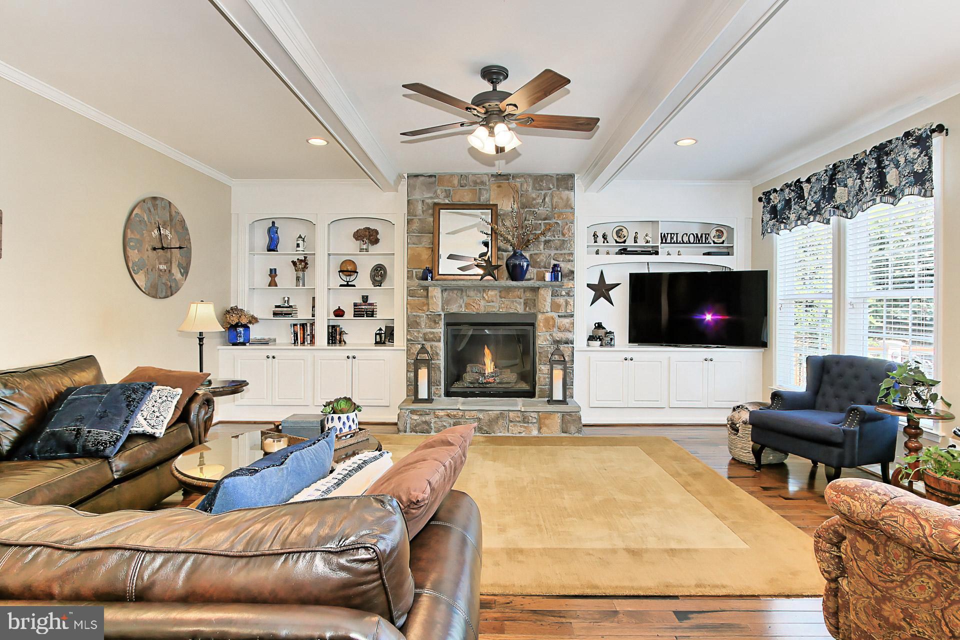 9335 Castle Hill Road Springfield, VA 22153 - Photo 18 of 53 Family room with gas fireplace & built in cabinets