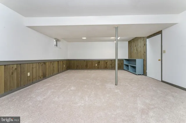 a room with furniture and pool table