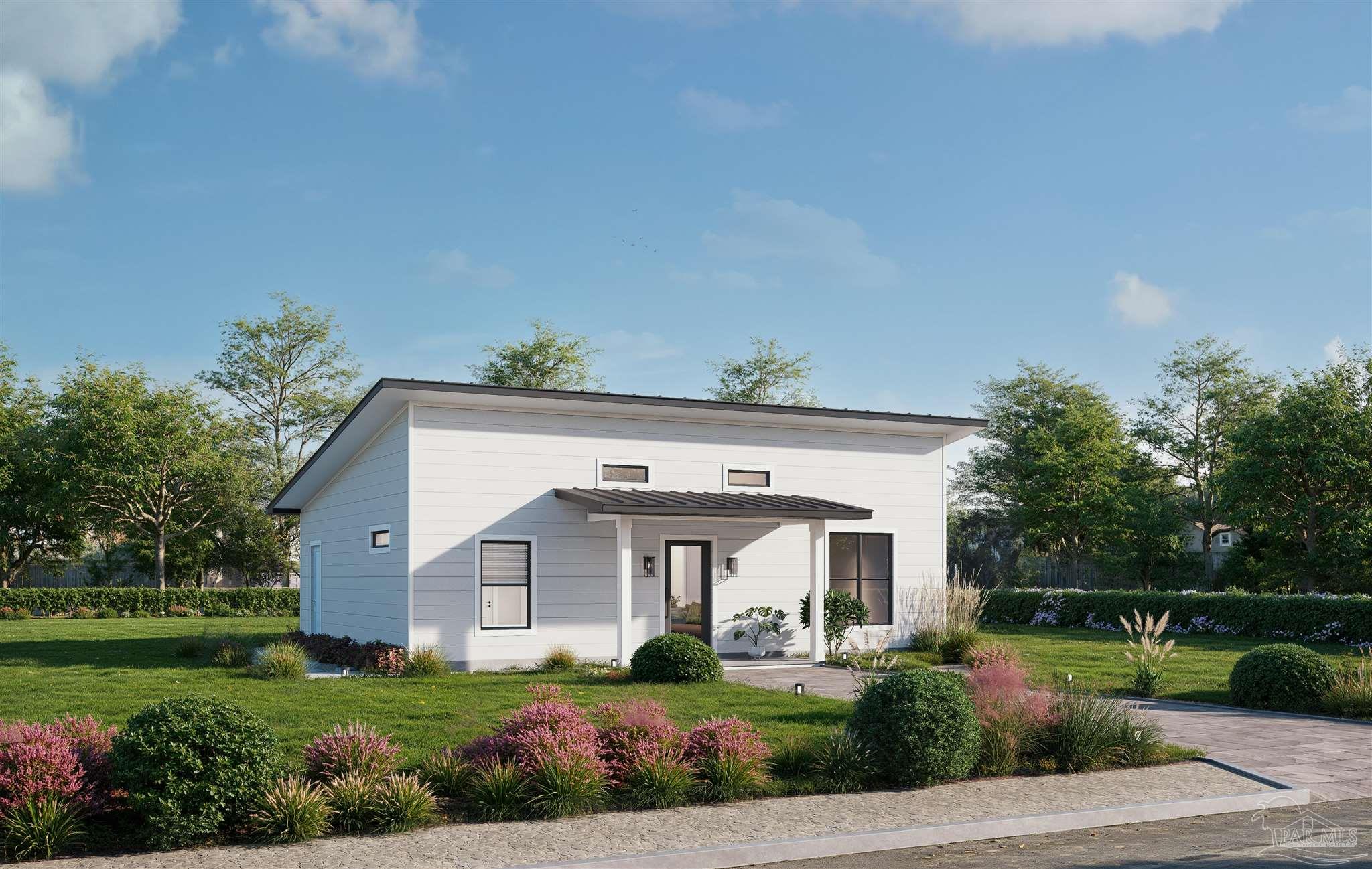 440 Western Pines Road Cantonment, FL 32533 - Photo 2 of 7 a front view of a house with a yard