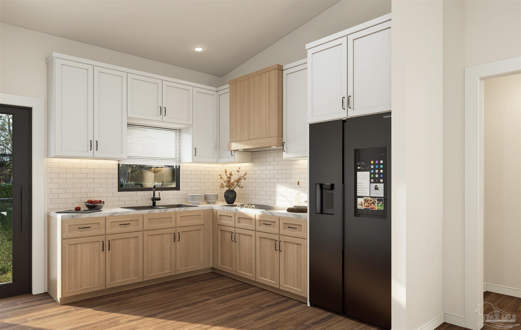 440 Western Pines Road Cantonment, FL 32533 - Photo 4 of 7 a kitchen with a sink dishwasher a refrigerator and cabinets with wooden floor