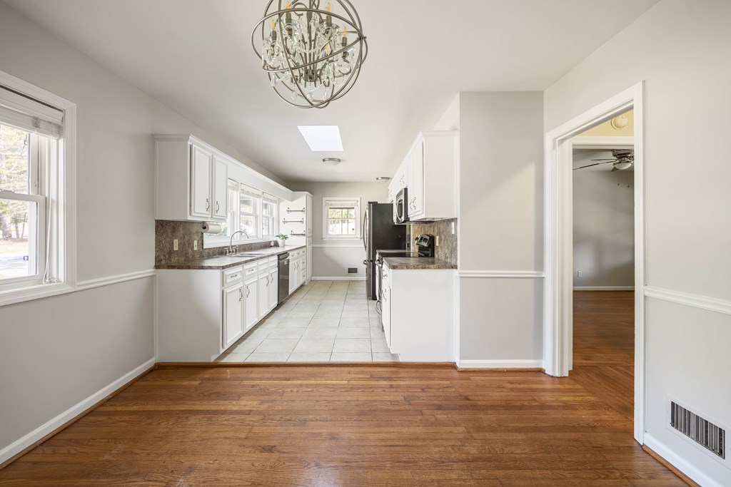 6366 Michael Avenue Columbus, GA 31909 - Photo 17 of 38 a view of kitchen with wooden floor