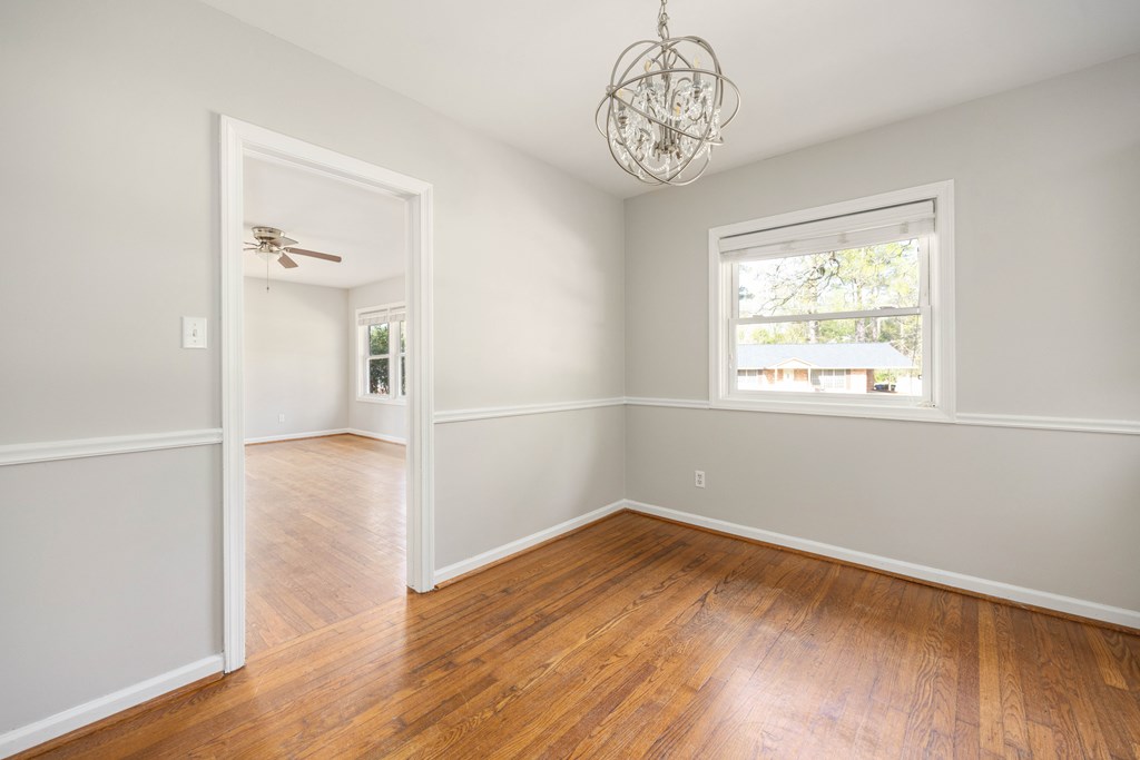 6366 Michael Avenue Columbus, GA 31909 - Photo 19 of 38 wooden floor in an empty room with a window