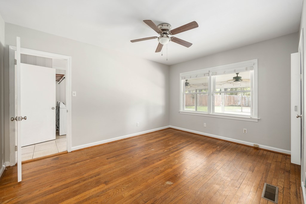 6366 Michael Avenue Columbus, GA 31909 - Photo 20 of 38 wooden floor in an empty room with a window