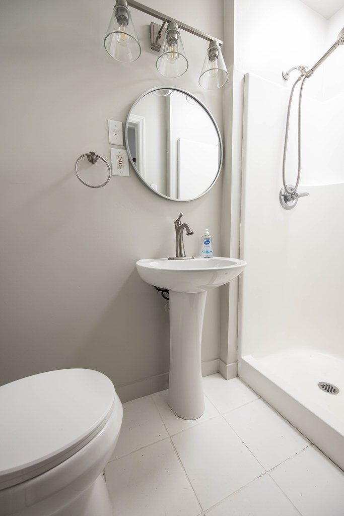 6366 Michael Avenue Columbus, GA 31909 - Photo 23 of 38 a bathroom with a sink toilet and mirror