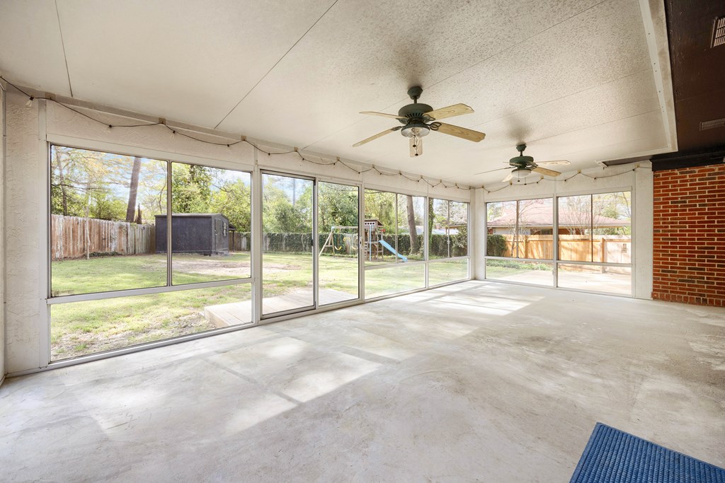 6366 Michael Avenue Columbus, GA 31909 - Photo 29 of 38 a view of an empty room with a fireplace and a flat screen tv