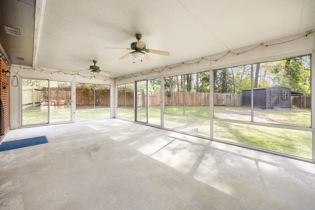 6366 Michael Avenue Columbus, GA 31909 - Photo 31 of 38 a view of an empty room with wooden floor and a fireplace