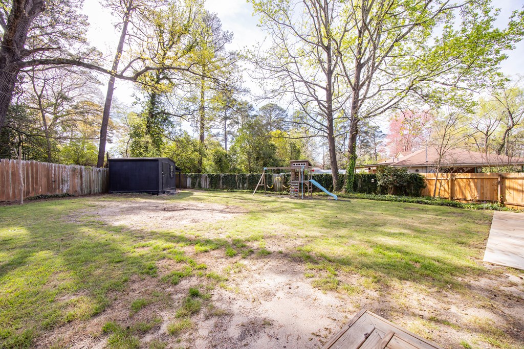 6366 Michael Avenue Columbus, GA 31909 - Photo 33 of 38 a view of a yard with a large tree