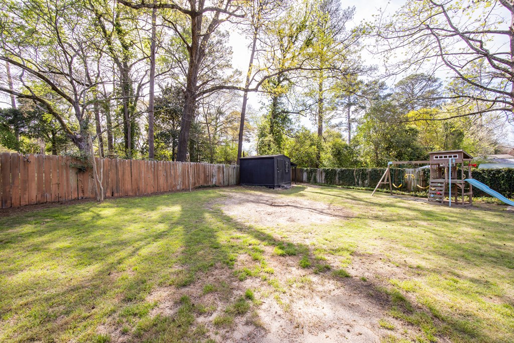 6366 Michael Avenue Columbus, GA 31909 - Photo 35 of 38 a backyard of a house with table and chairs
