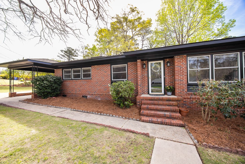 6366 Michael Avenue Columbus, GA 31909 - Photo 6 of 38 a house view with a garden space