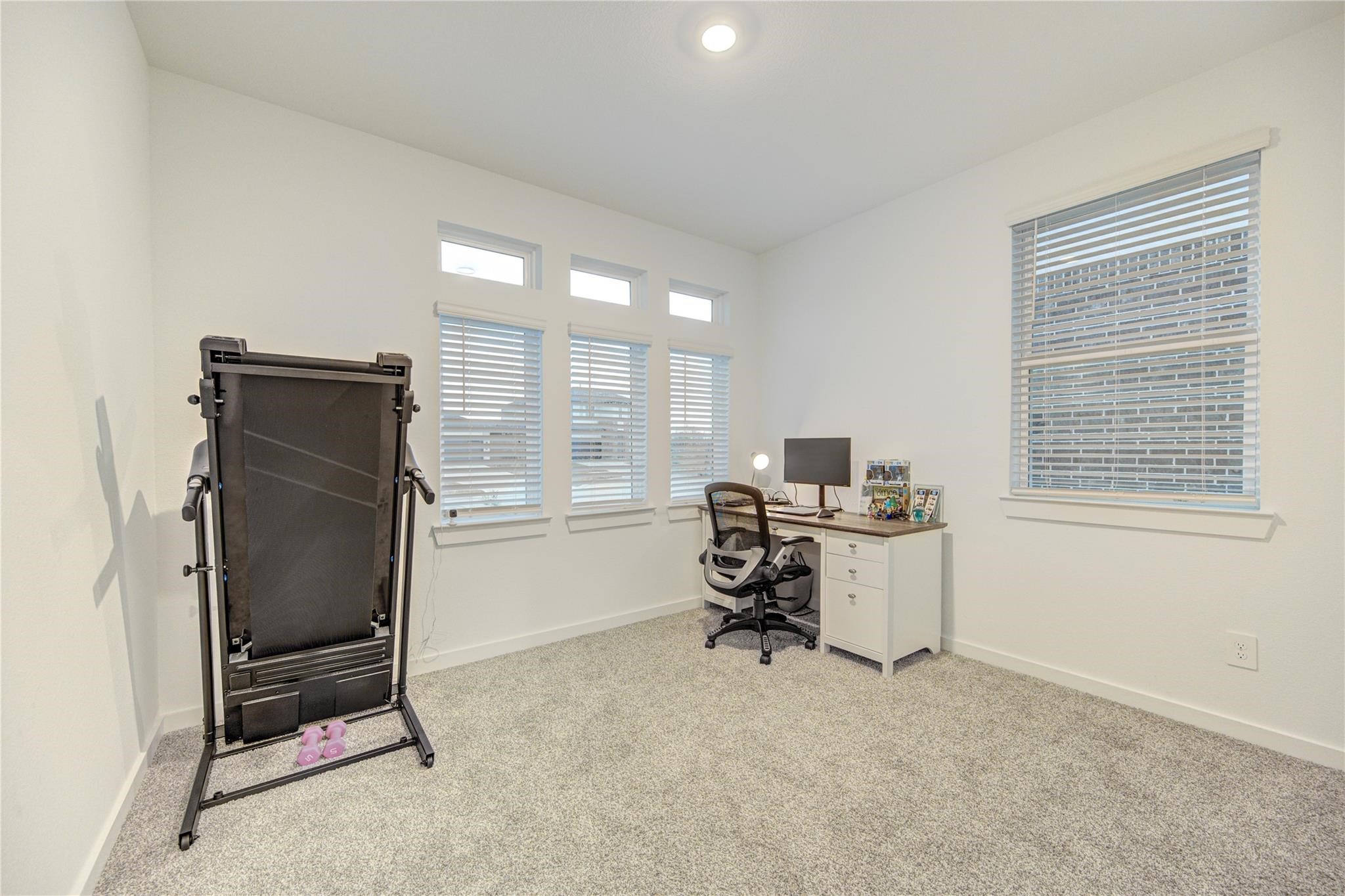 22515 Modica Rift Lane Katy, TX 77449 - Photo 11 of 34 a view of workspace with windows