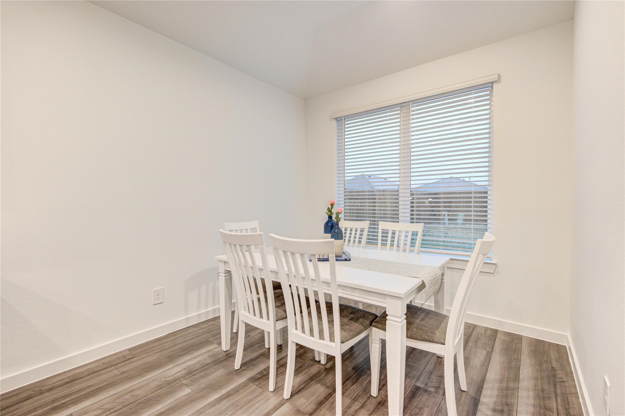 22515 Modica Rift Lane Katy, TX 77449 - Photo 24 of 34 a view of a dining room with furniture and window