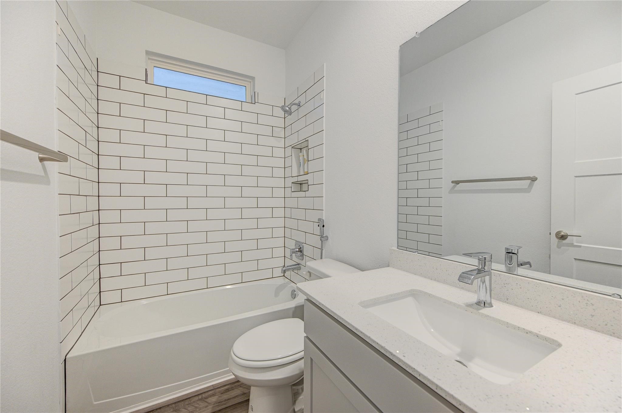 22515 Modica Rift Lane Katy, TX 77449 - Photo 10 of 34 a bathroom with a sink toilet and shower