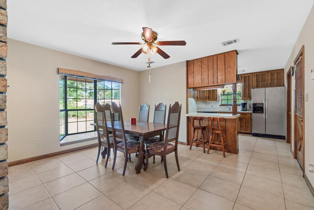 710 Ridge Lake Road Crestview, FL 32536 - Photo 24 of 43 a view of a dining room with furniture