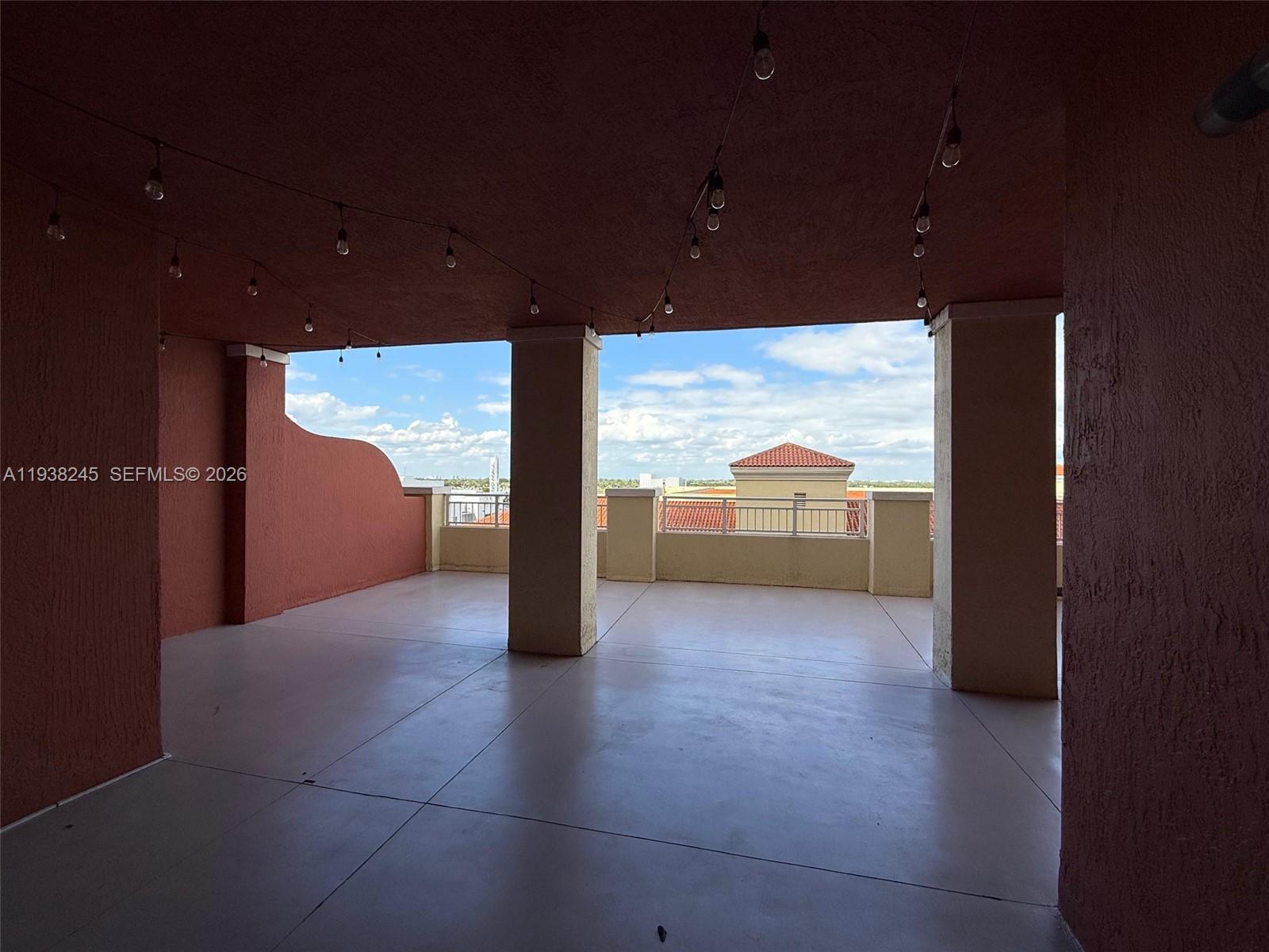 7350 Southwest 89th Street, Unit 907S Miami, FL 33156 - Photo 18 of 25 a view of an empty room with a window