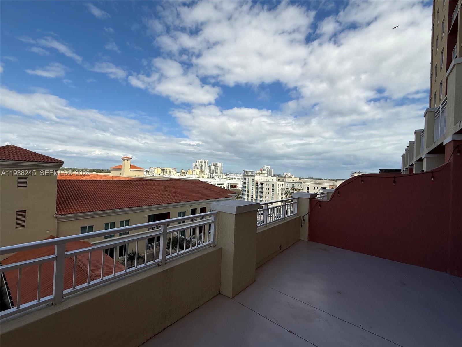 7350 Southwest 89th Street, Unit 907S Miami, FL 33156 - Photo 19 of 25 a view of a city from a balcony