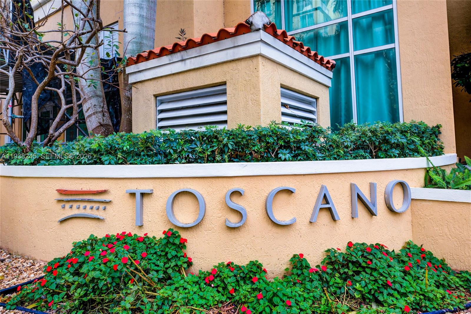 7350 Southwest 89th Street, Unit 907S Miami, FL 33156 - Photo 4 of 19 a view of sign board with flower around