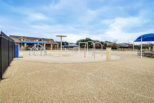a view of swimming pool with outdoor seating