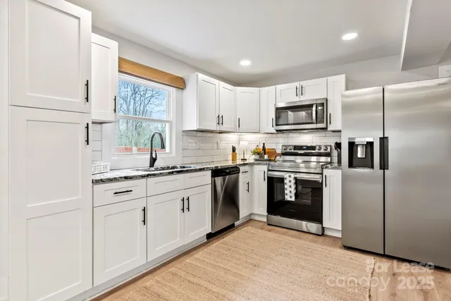 a view of balcony with chairs and wooden floor
