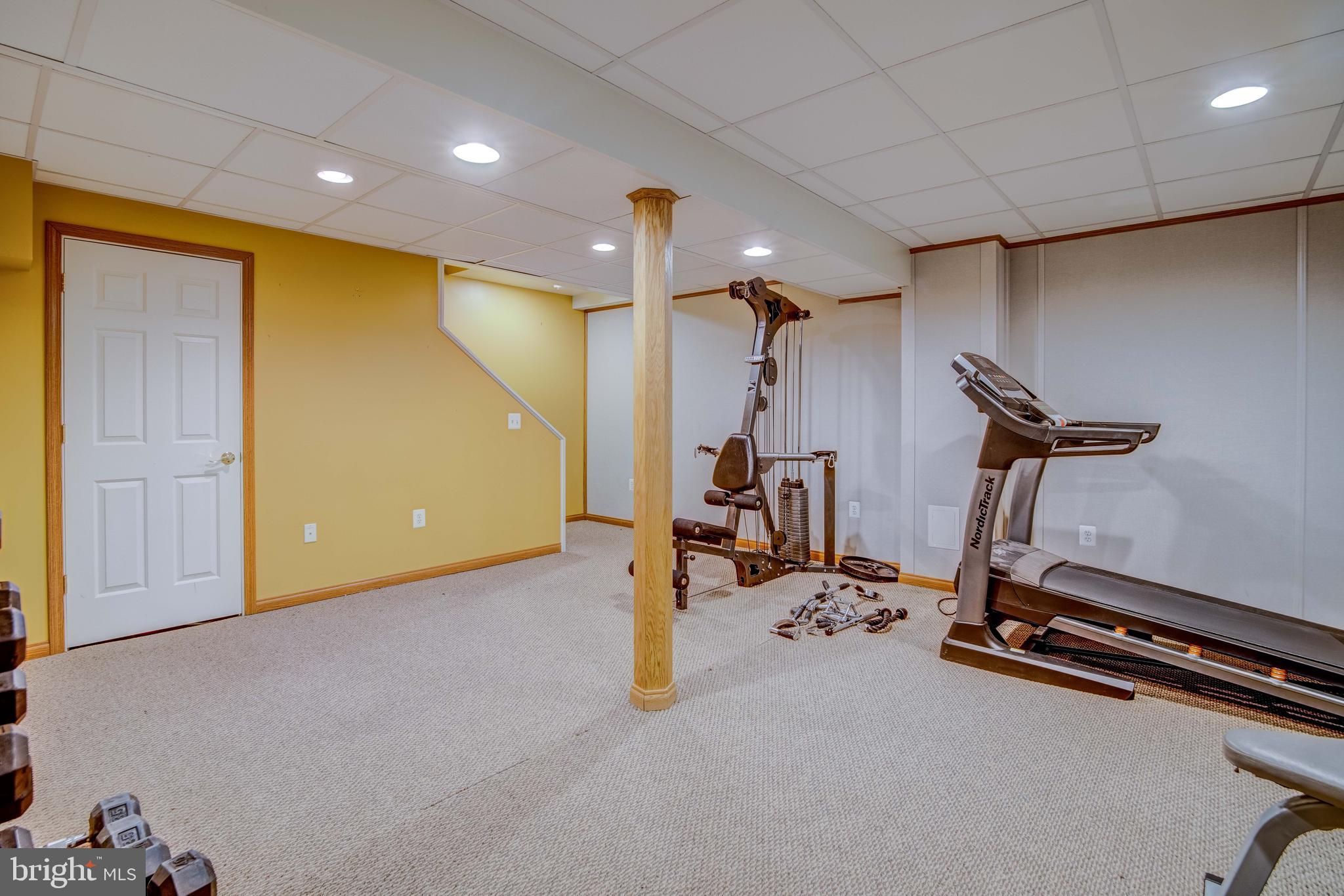 11431 Rawhide Road Lusby, MD 20657 - Photo 25 of 31 a view of a room with gym equipment