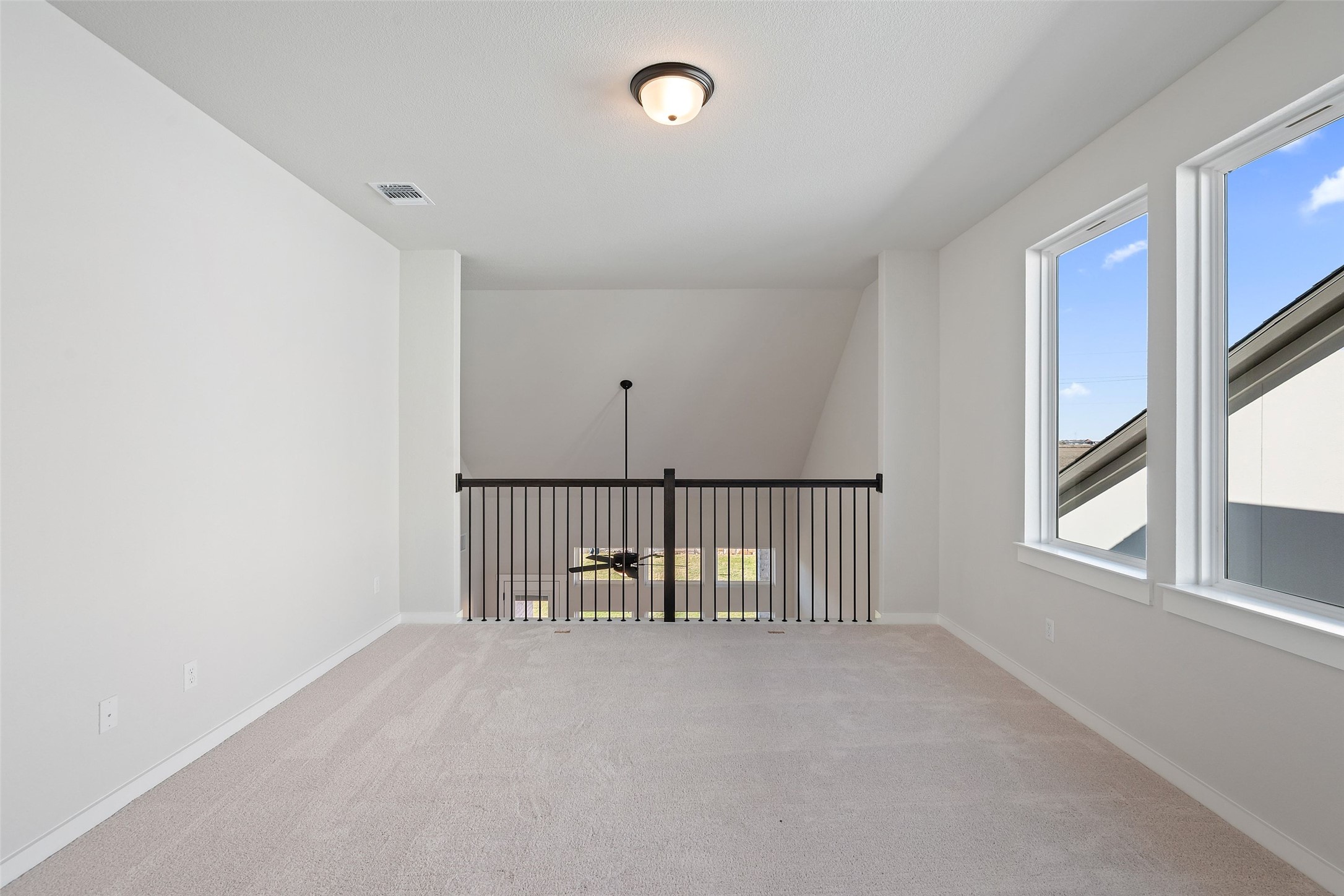 228 Brandywine Road Hutto, TX 78634 - Photo 31 of 40 an empty room with windows